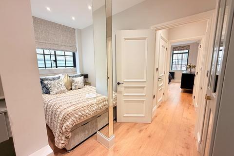 Flat 2, 88 Portland Place, London, W1B 1NX