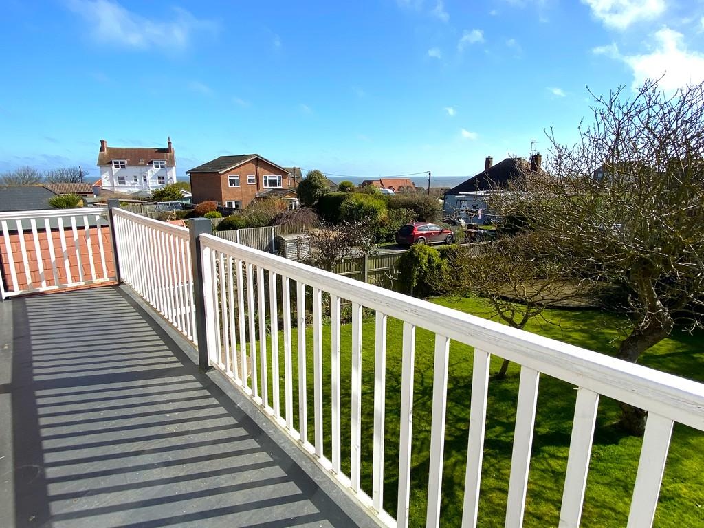 Balcony with distant sea view