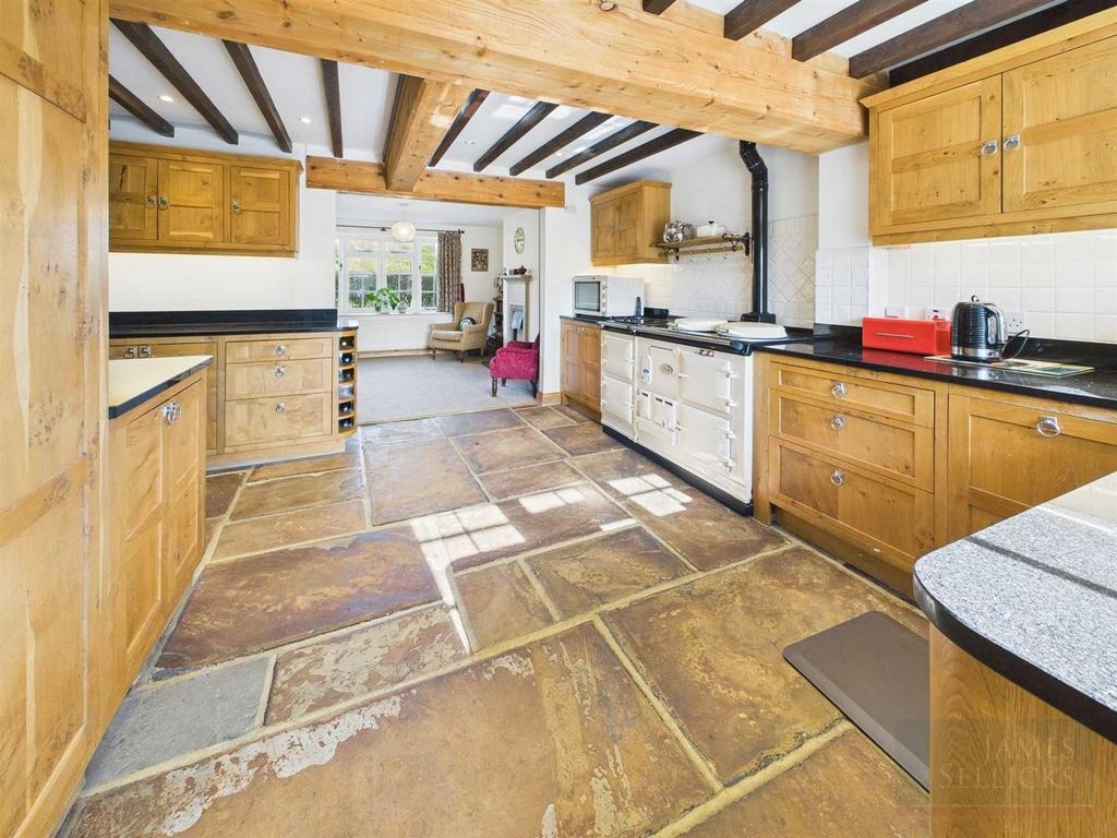 L shaped kitchen open to family room