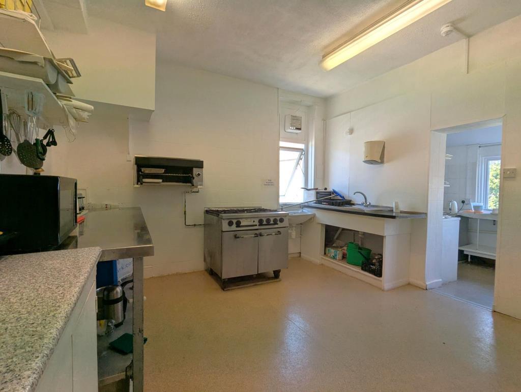 A reverse angle view of the first floor kitchen