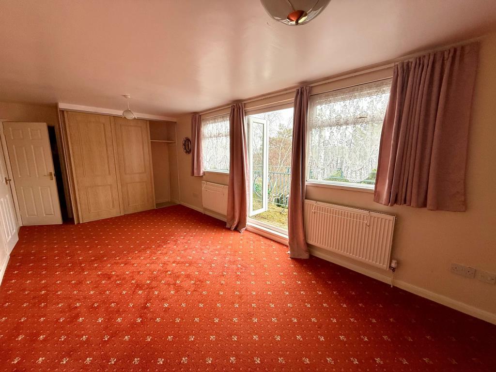 Bedroom four with balcony