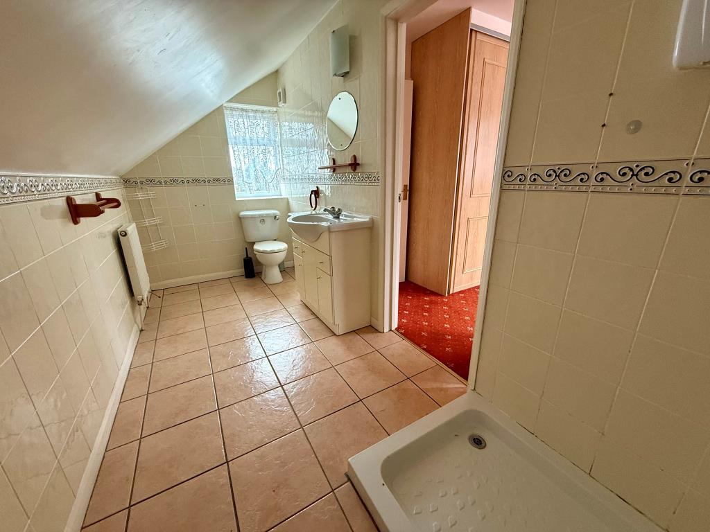 En-suite shower room with W.C.
