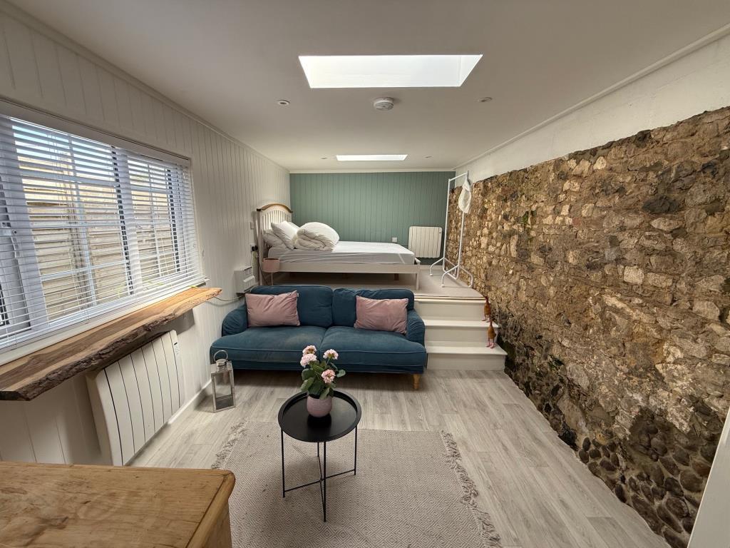Living room with Mezzanine floor to bedroom