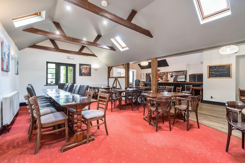 Seating in restaurant area with carpet