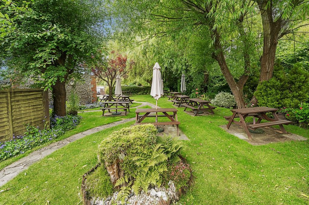Pub garden with picnic benches