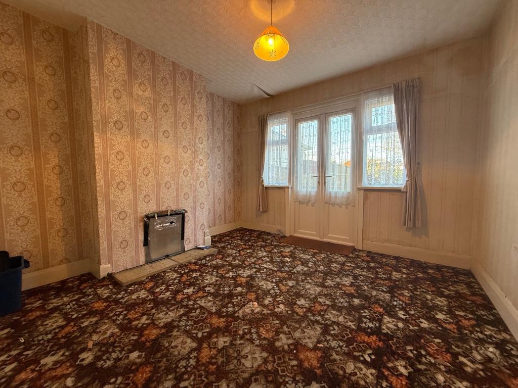 Reception room with French Doors opening to rear g