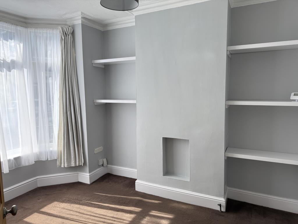 Living room with painted walls and bay window