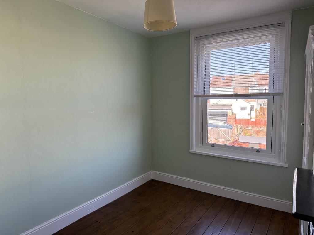 Bedroom at rear of property