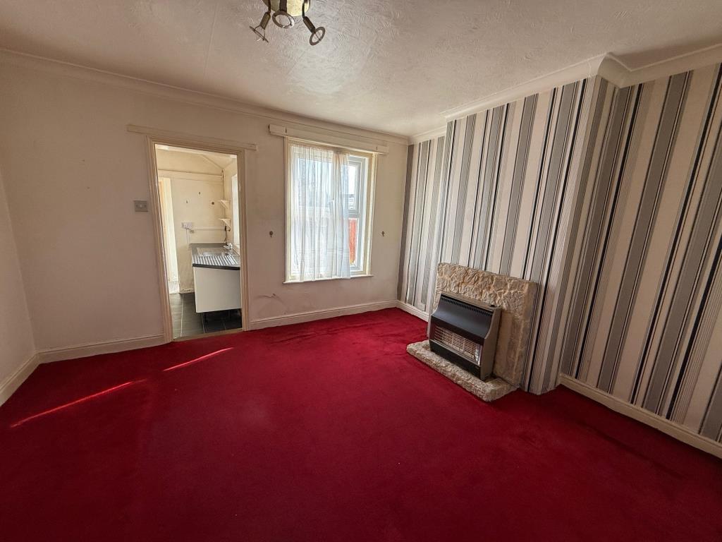 Dining Room with window to rear and access to Kitc