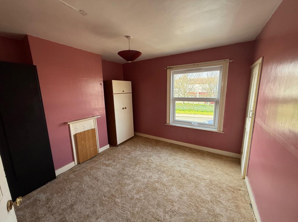 Bedroom 1 with double glazed window to front and f