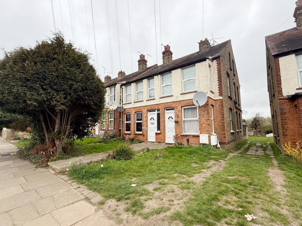 Front aspect of block with front door leading to c