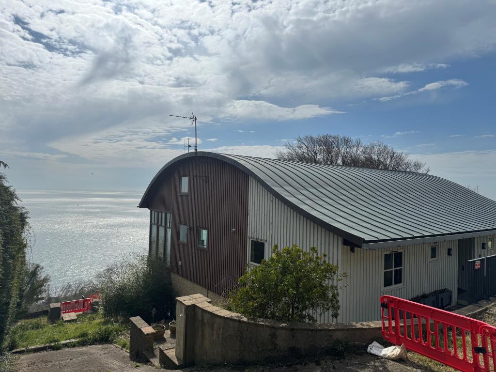 The House and Sea Beyond from Leeson Road