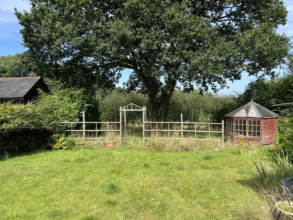 View of garden with summer house