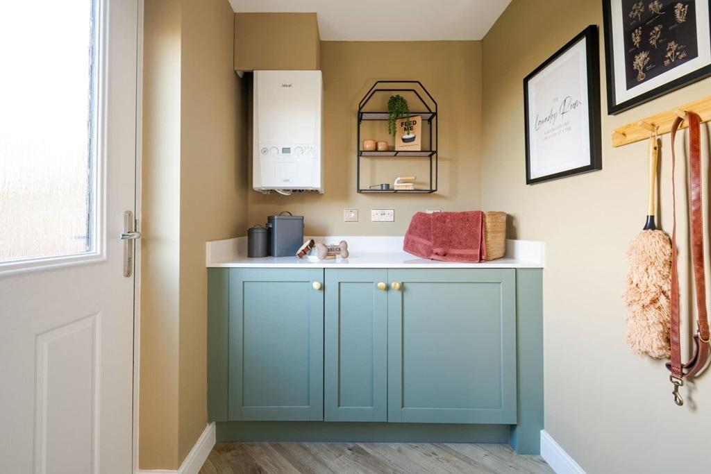 Utility room with access to rear garden