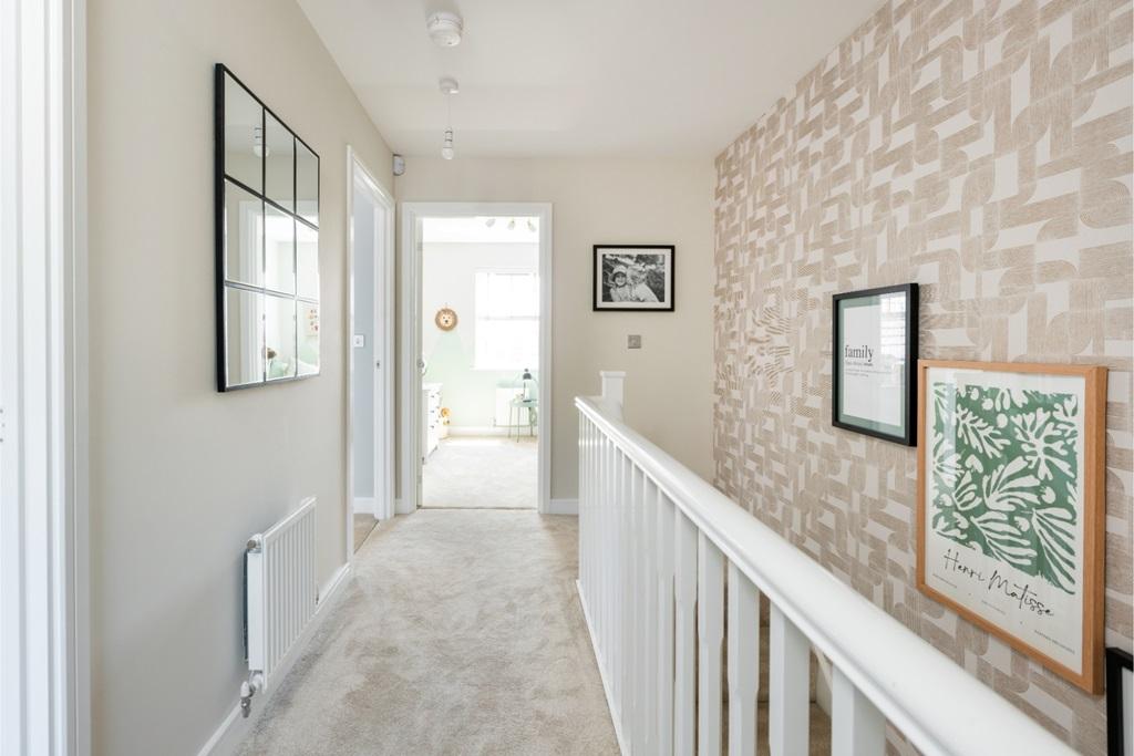 Make your way to the bedrooms in the Keeford