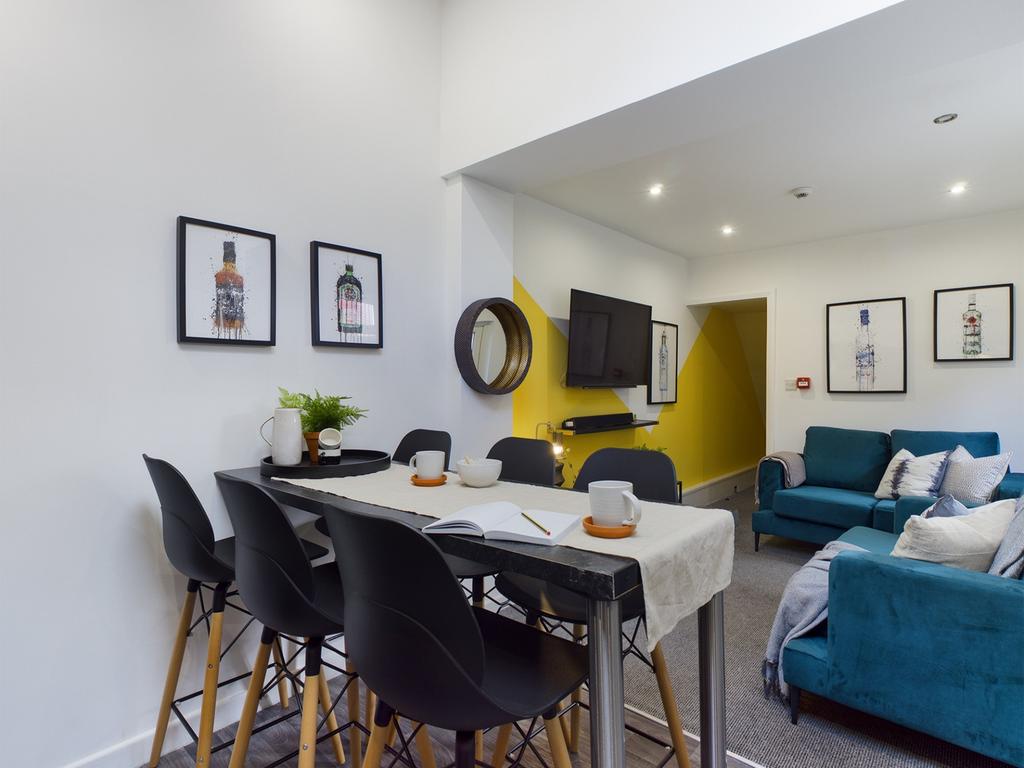 A spacious and stylish modern living room, perf...