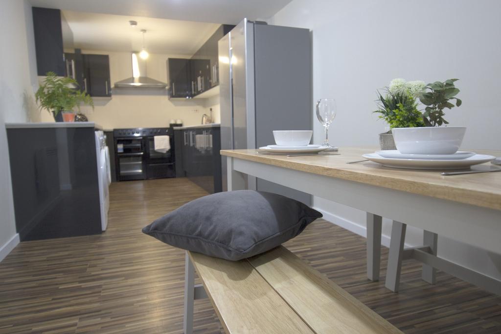 A modern and well-maintained kitchenette with s...