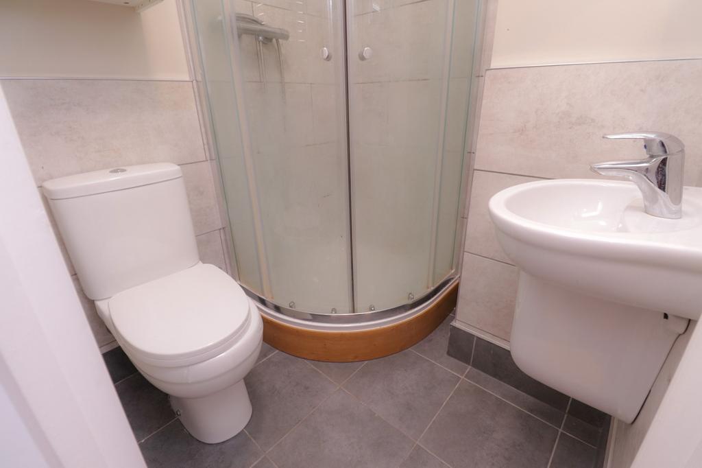 A modern and clean bathroom featuring a sleek s...