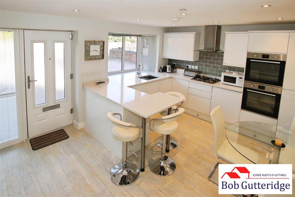 Open plan fitted kitchen/dining room