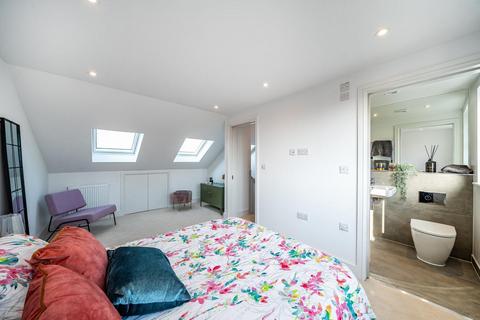 22 Croft Road, London, SW19 2NF