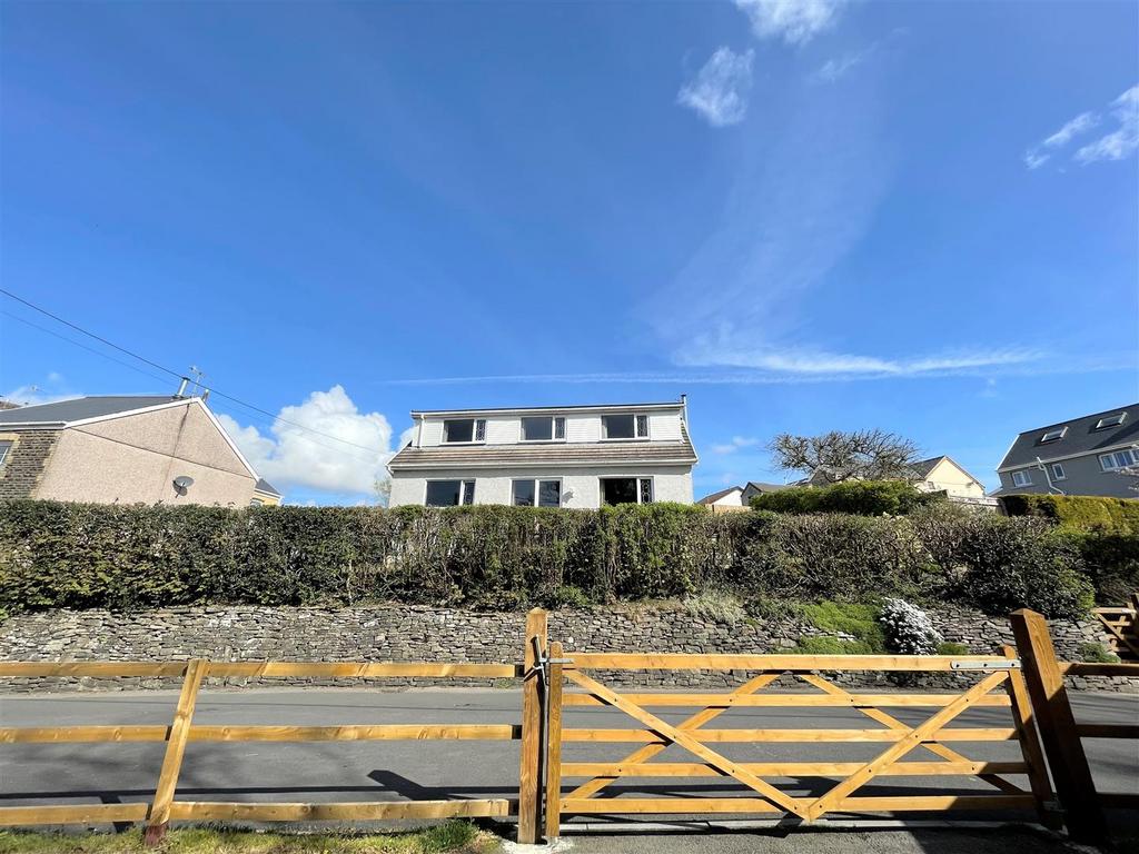 View of house from the parking area