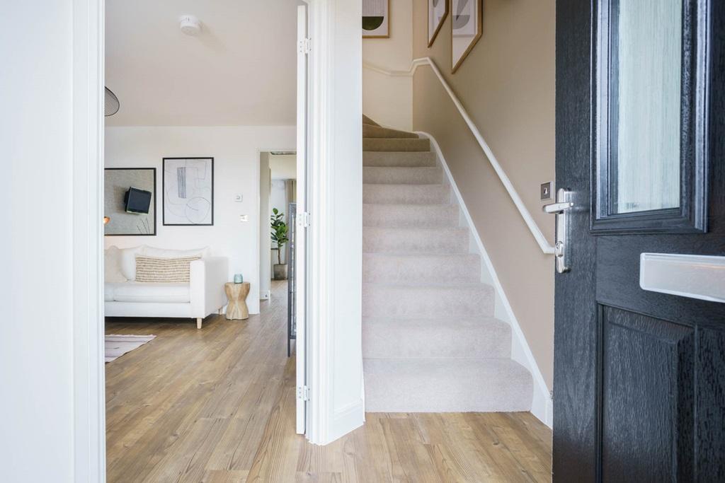 The entrance hall leads to the lounge