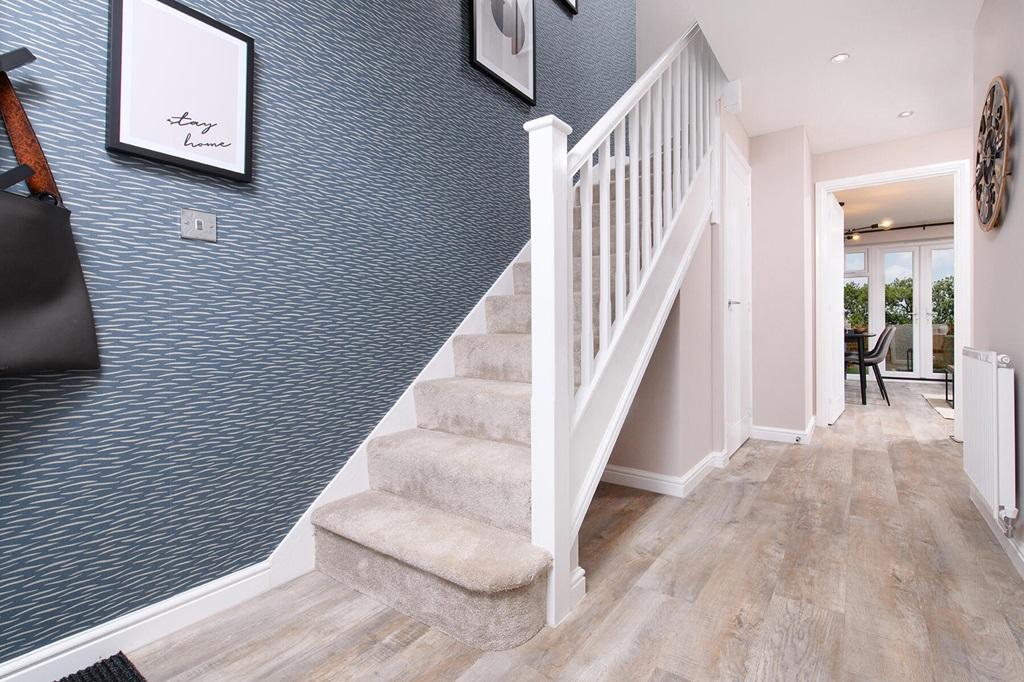 A welcoming hallway with storage space to hide...