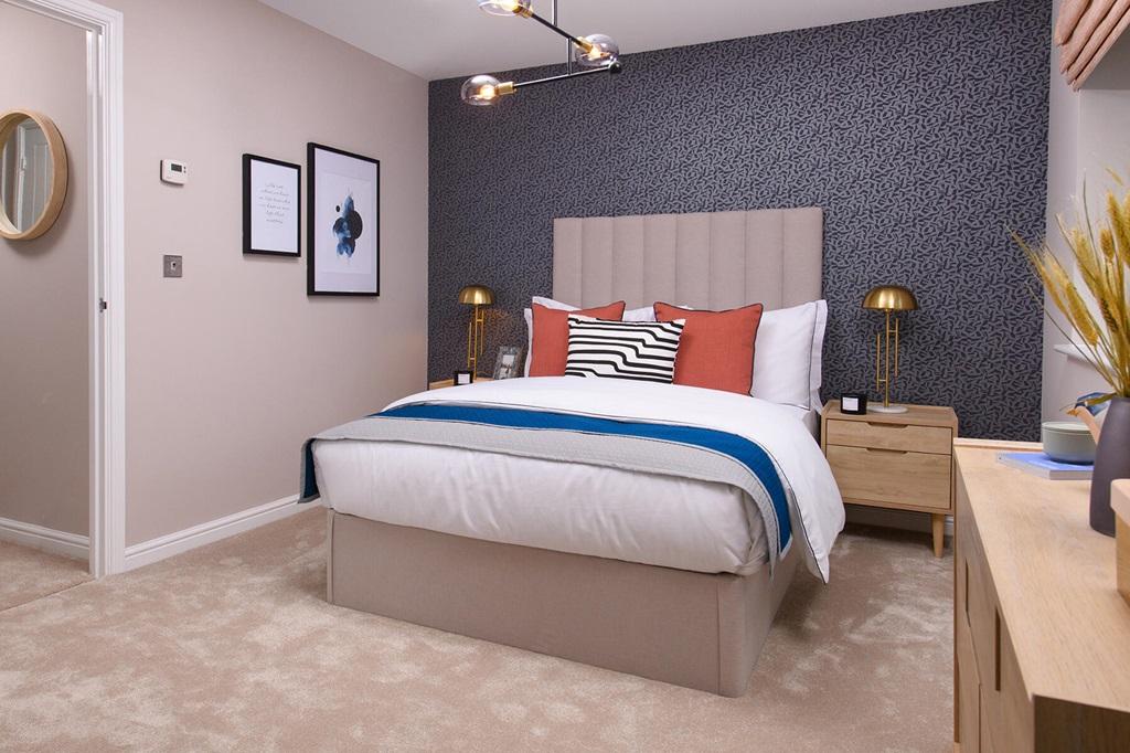 Relax and unwind in the spacious main bedroom