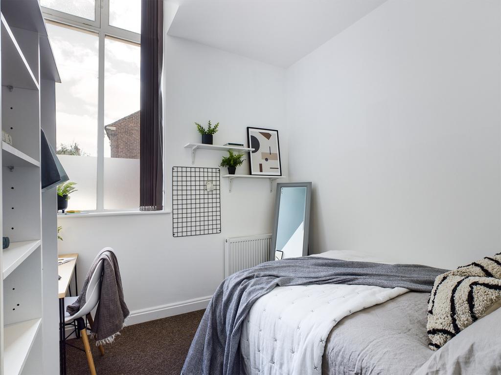 A bright and inviting double bedroom, perfect f...