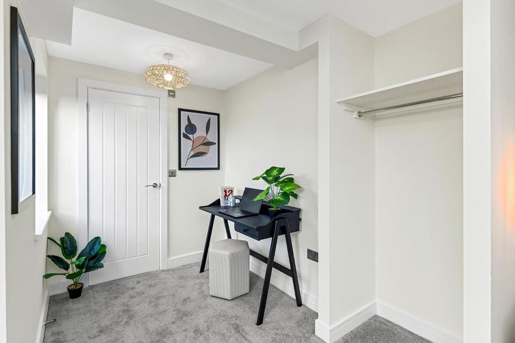A stylish communal workspace featuring a sleek ...