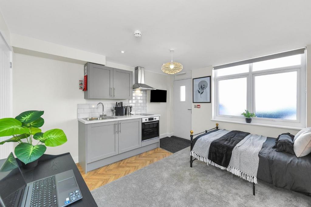 A beautifully designed double bedroom featuring...
