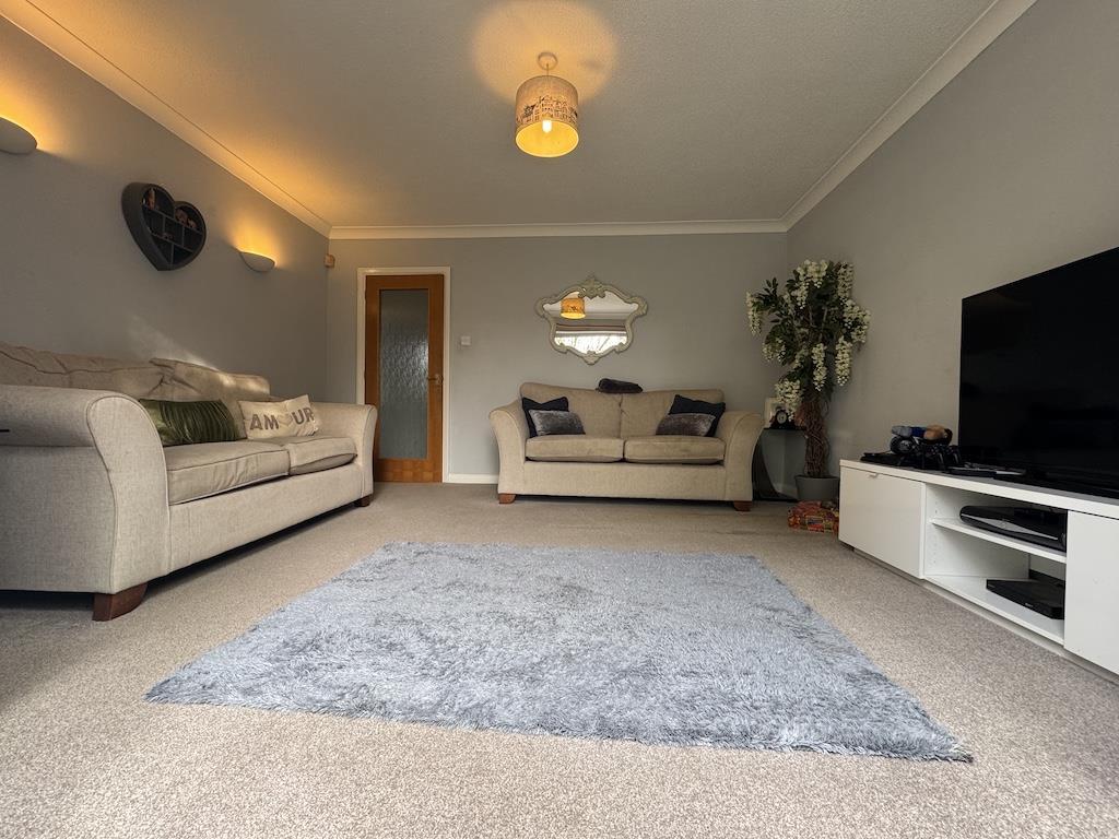 6 - Sitting Room to front.jpg