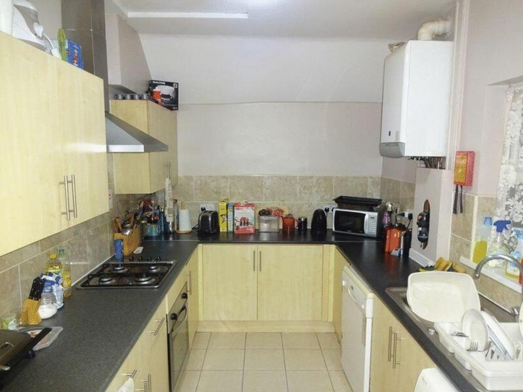 A functional and well-equipped kitchenette perf...