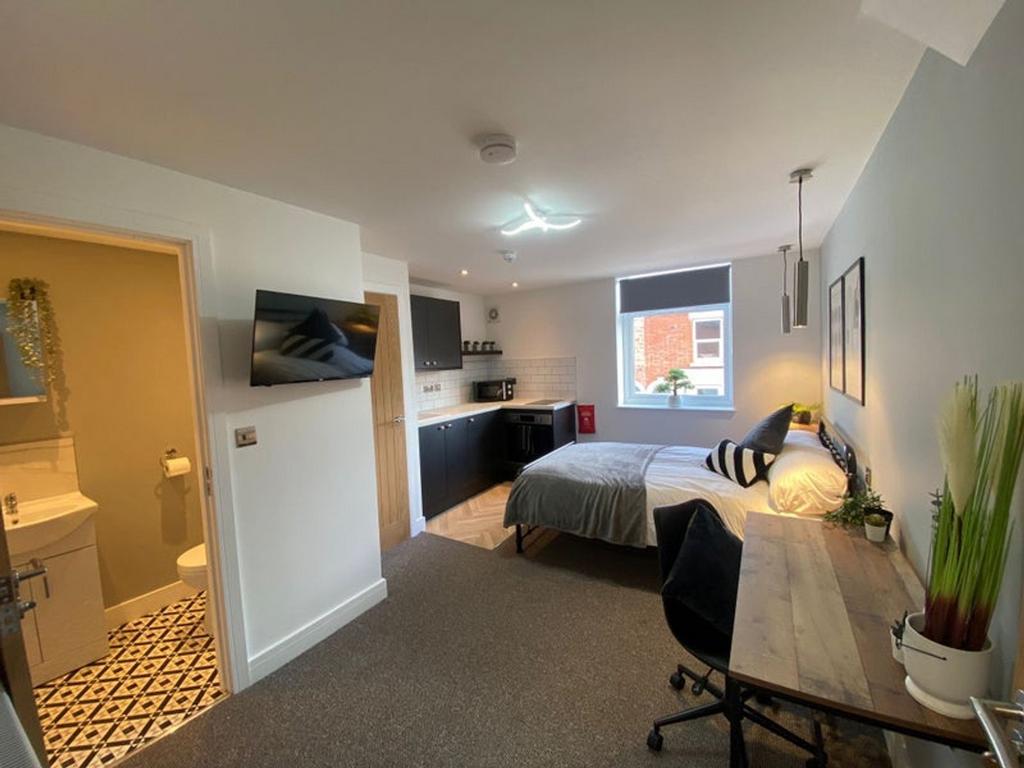 This inviting double bedroom combines comfort w...