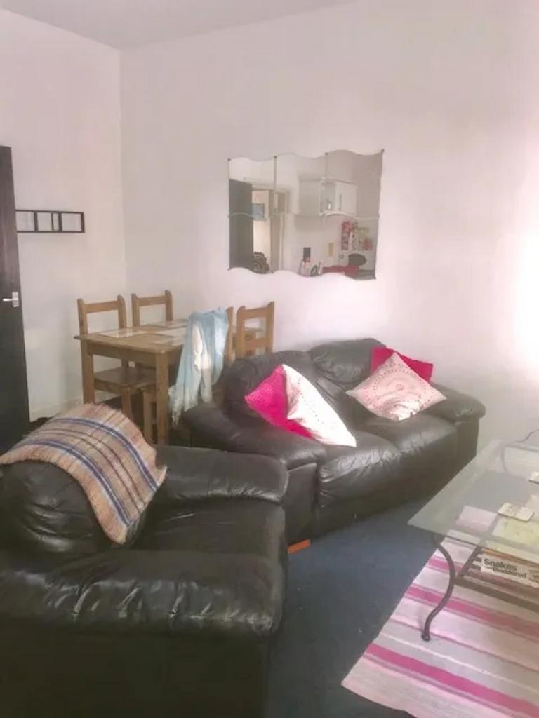 A cozy living room with inviting seating, perfe...