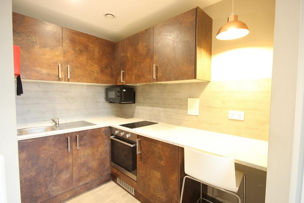 A modern and clean kitchenette featuring stylis...