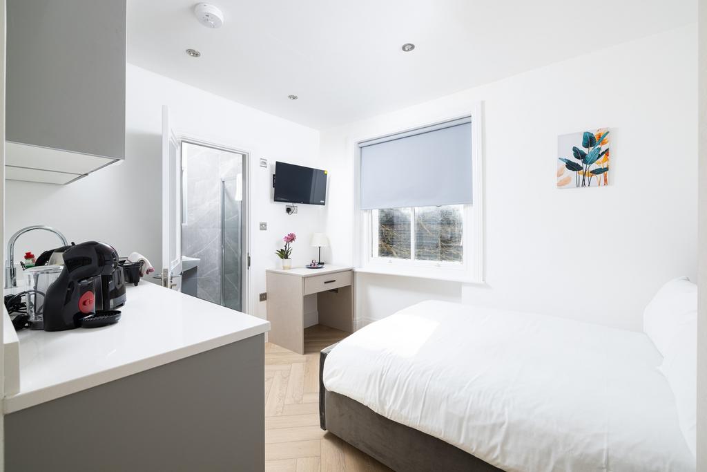 Bright and inviting double bedroom featuring a ...