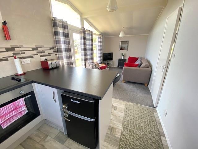 OPEN PLAN LIVING ROOM, DINING AREA &amp; KITCHEN
