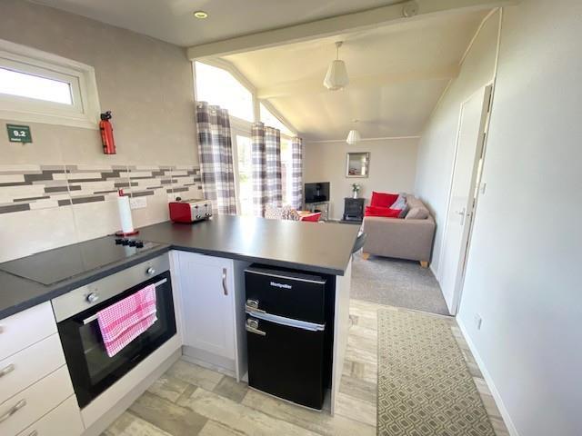 OPEN PLAN LIVING ROOM, DINING AREA &amp; KITCHEN