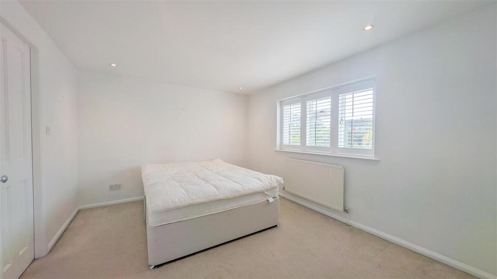 The White Orchard Bedroom Three.png