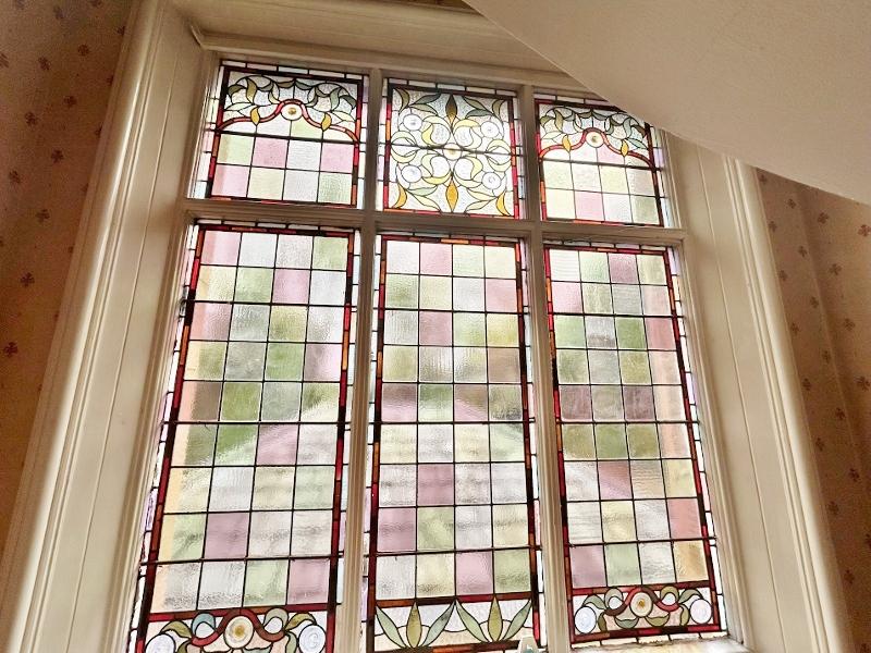 Stain glass window on landing
