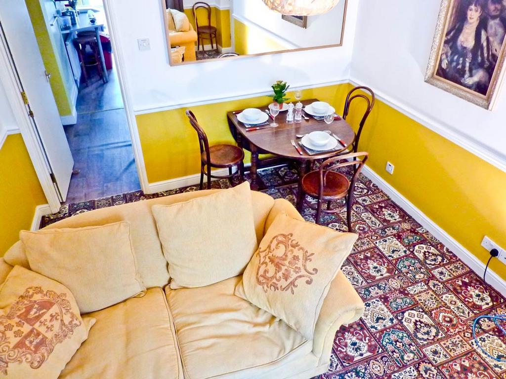 A bright and inviting living room with comforta...