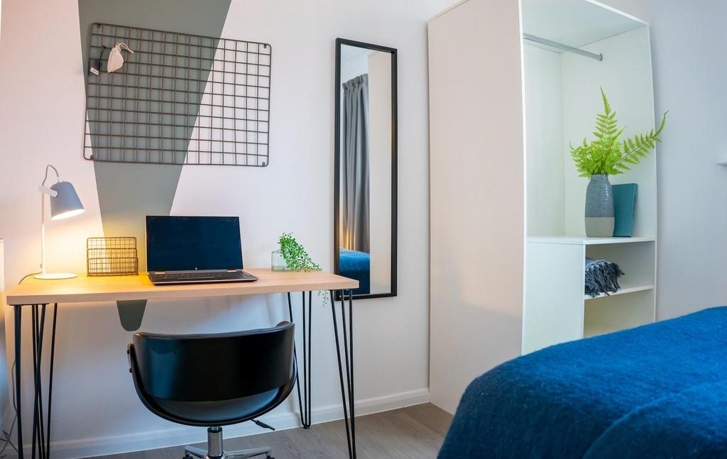 A stylish and inviting double bedroom featuring...
