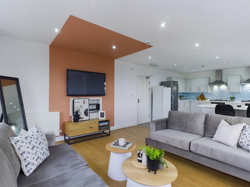 A spacious and inviting modern living room with...