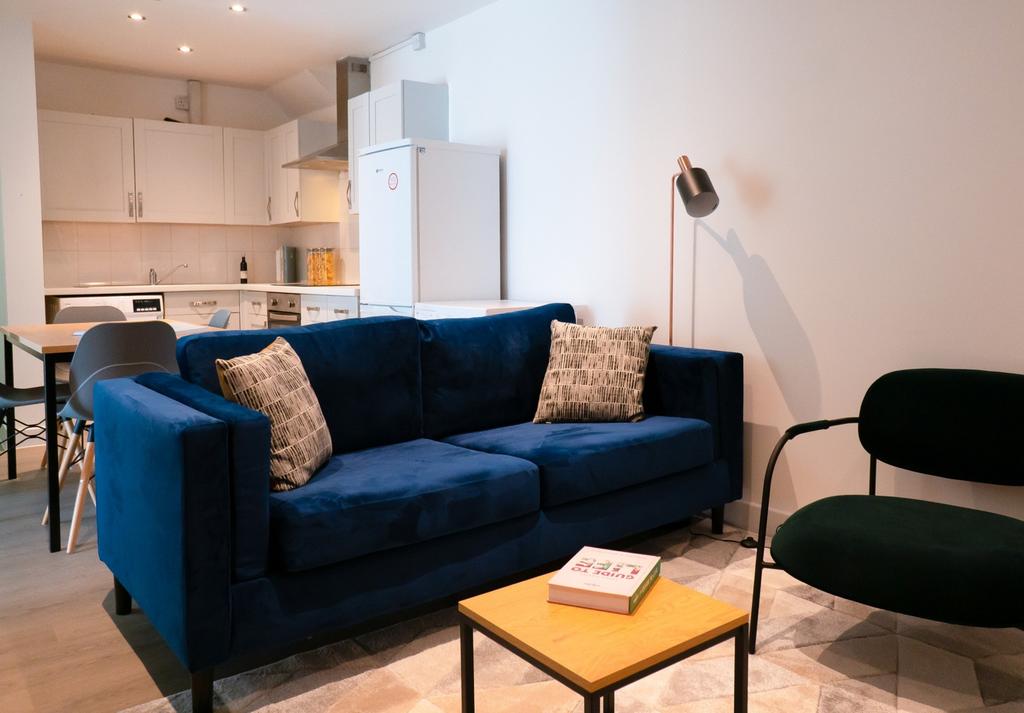 A bright and inviting living room with modern f...
