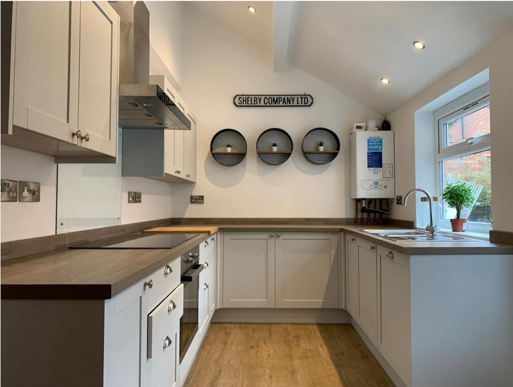 Modern, well-appointed kitchen featuring sleek ...