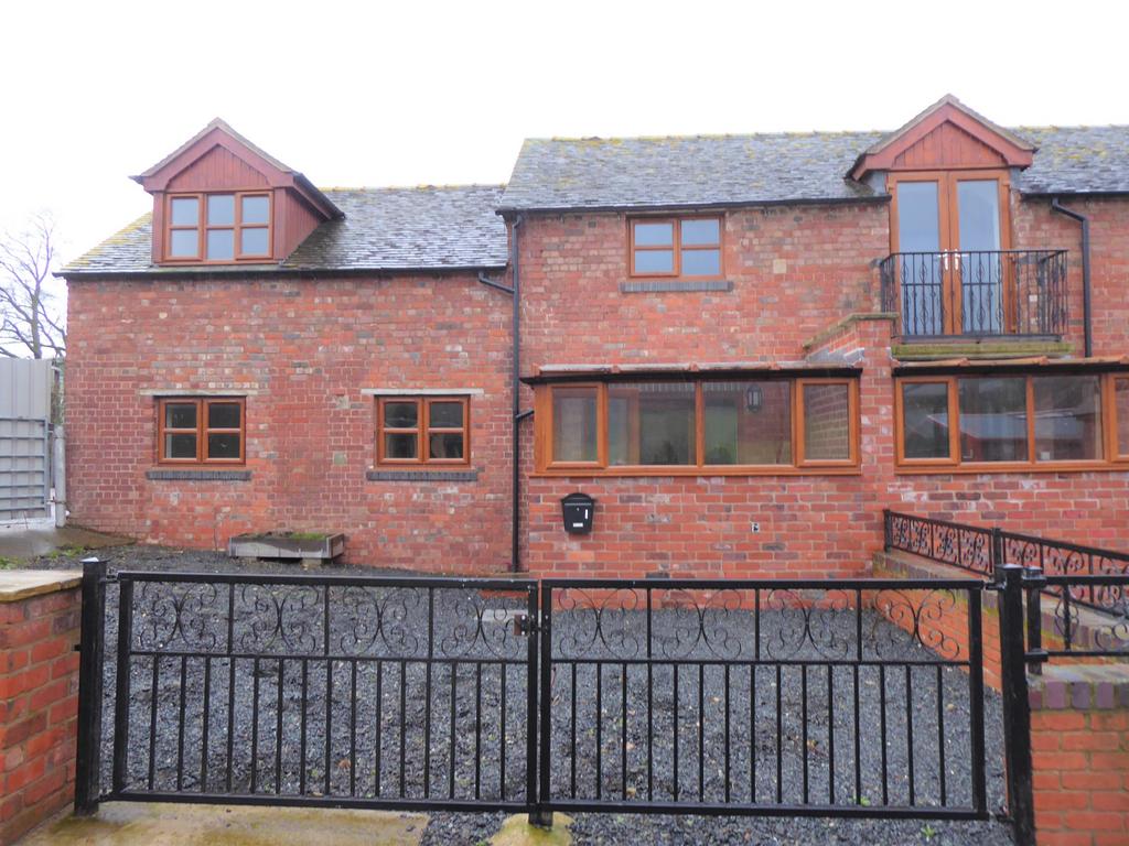 A recently built end of terrace three bedroom hou