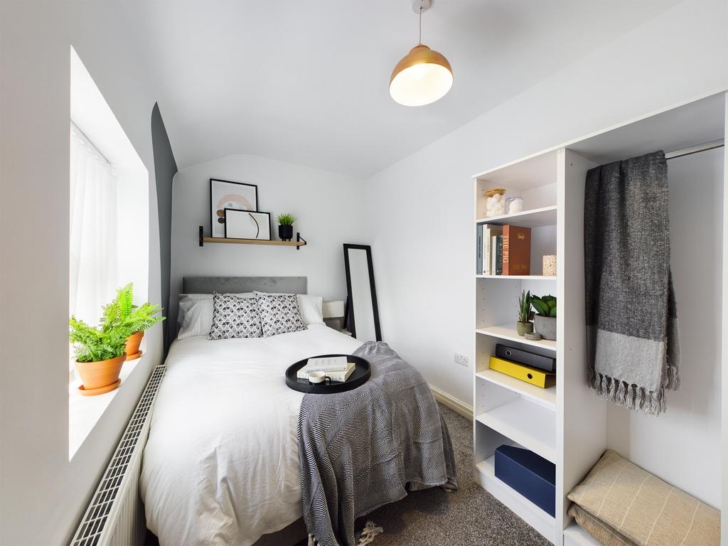 A bright and inviting double bedroom, perfect f...