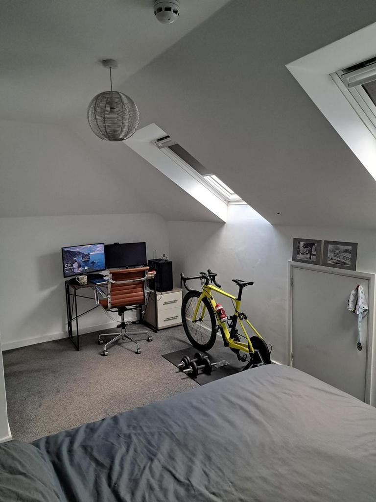 This inviting double bedroom features ample nat...
