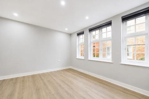 Studio to rent, Fouberts Place,  Soho, W1F